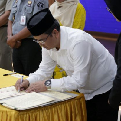 Bersama Pj Gubernur Sulsel, Khaeroni Tanda Tangani MoU Pembentukan Tim Terpadu Layanan Hukum