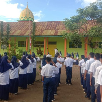 MTs Al-Ikhwan Tumbuhkan Jiwa Nasionalisme Dan Patriotisme Lewat Upacara Bendera