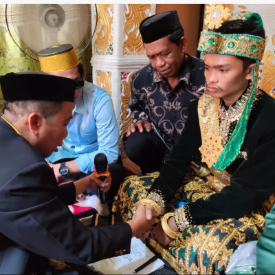 KUA TELLU SIATTINGE BERKIBAR pada acara Akad Nikah Putra Kepala Desa Ajjalireng